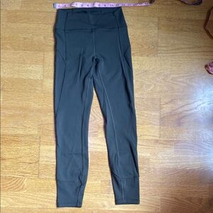 25” Lululemon High-Waisted Dark Green Leggings Size 4